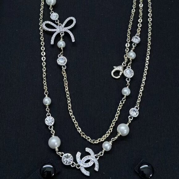 CHANEL Jewelry - Authentic CHANEL Bow Charm Long Chain Necklace